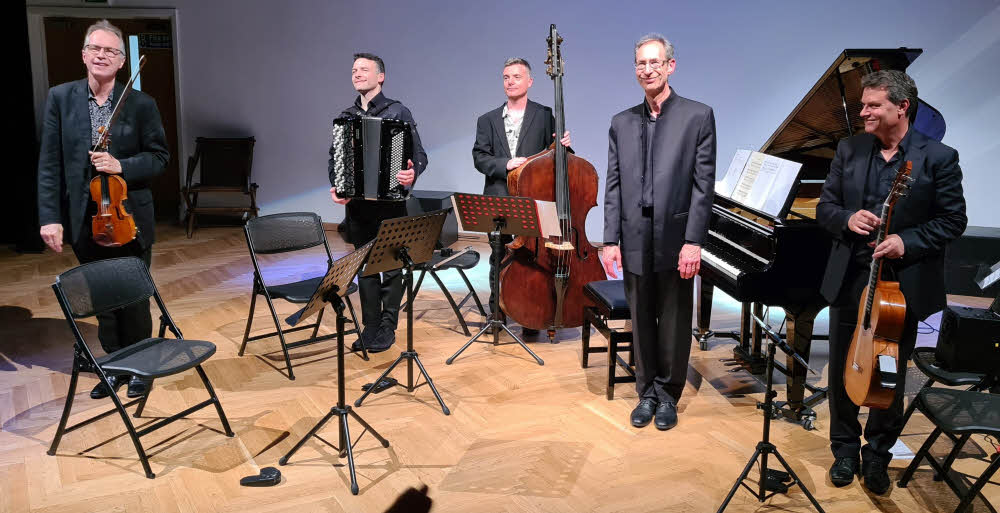 The quintet receiving a well-deserved round of applause